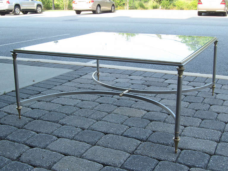 Mid-Century square steel and brass coffee table, in the style of Jansen.