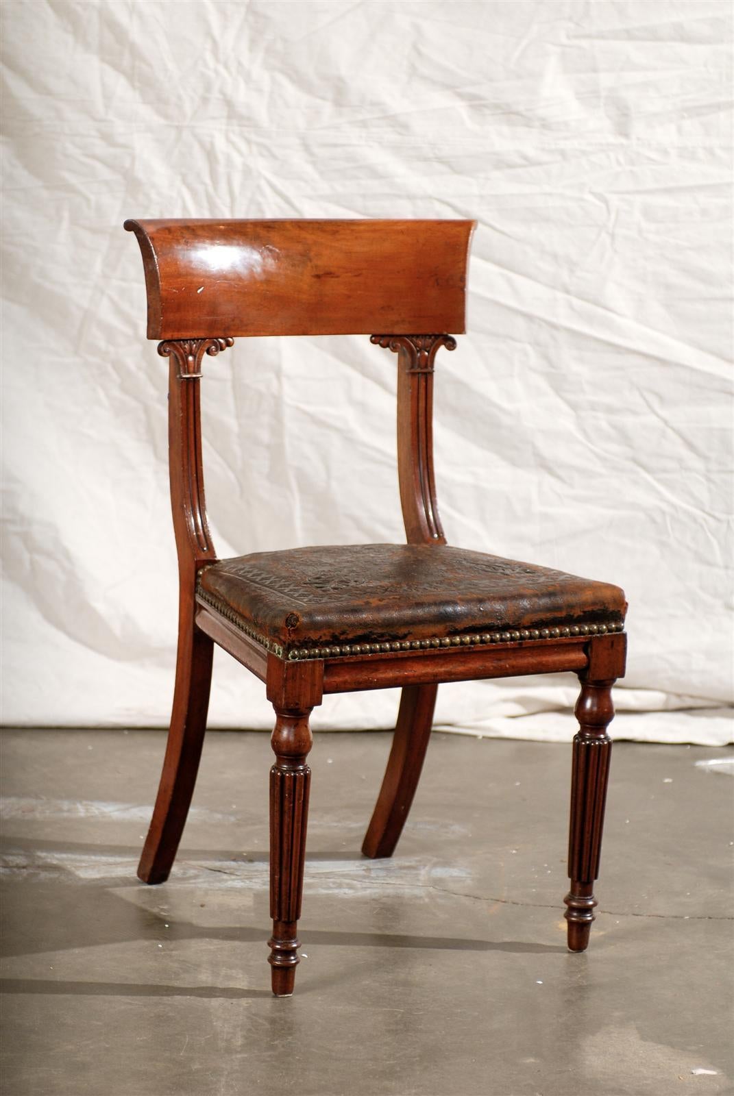 Set of four 19th century William IV mahogany side chairs.