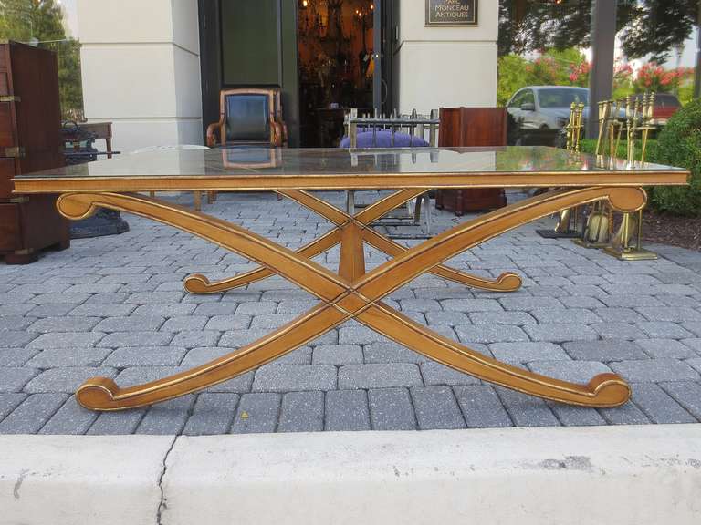 Mid-20th century gilt edged wood coffee table with glass top.