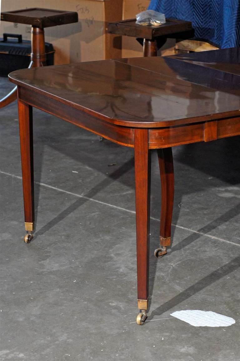 19th century George III inlaid mahogany extension dining table with five leaves,(5 leaves: 11.75