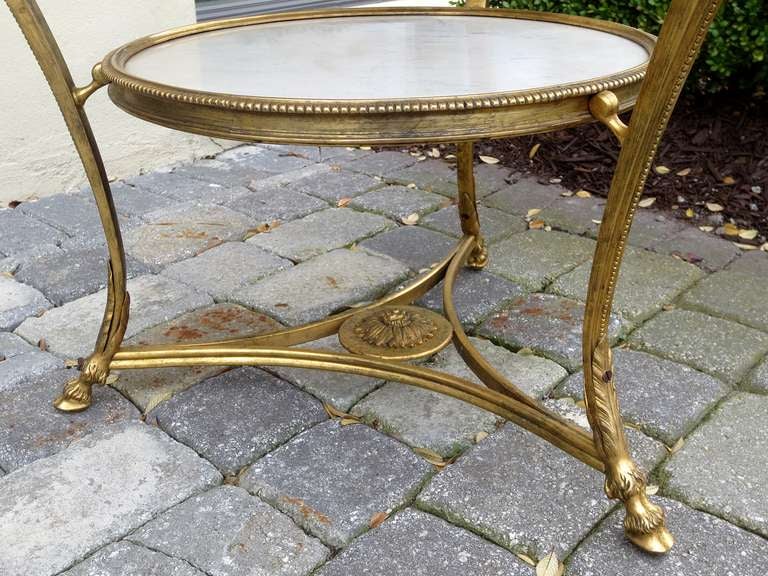 20ième siècle Table guéridon de style Louis XVI du 20ème siècle en marbre et bronze doré