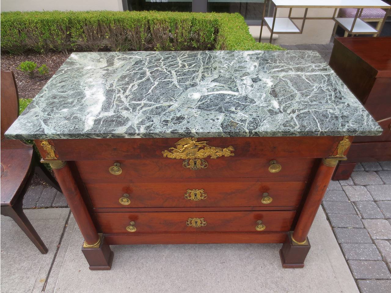 19th century French empire commode with marble top.