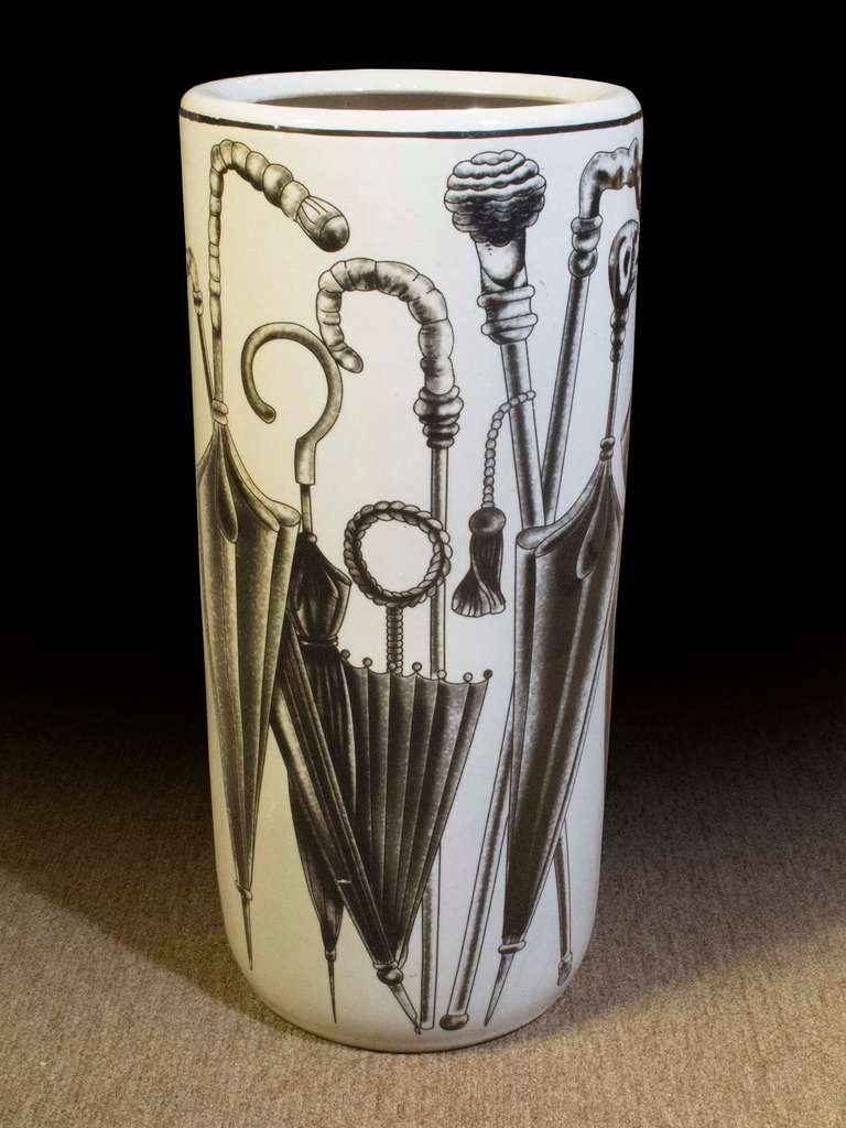 # A502 - Mid Century Modern Pop Art Umbrella Stand Porcelain Ceramic Signed Japanese mark<br />
Fantastic Pop Art in Fornasetti style screen print of various types of umbrellas in black on a gray white ground.<br />
This umbrella stand is made out