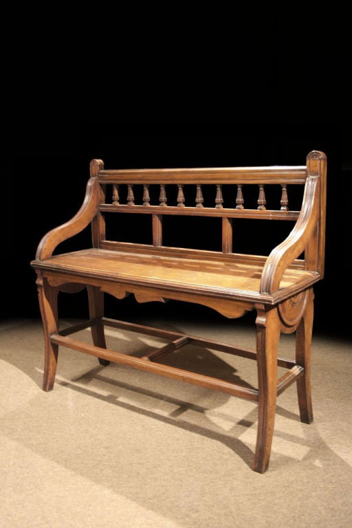 # V526 - Victorian bench after designs by Schoolbred. Schoolbred was a distinguished Victorian firm, established in 1870, working in numerous styles they developed a reputation for quality and were issued a Royal warrant in the mid 1880s. The work
