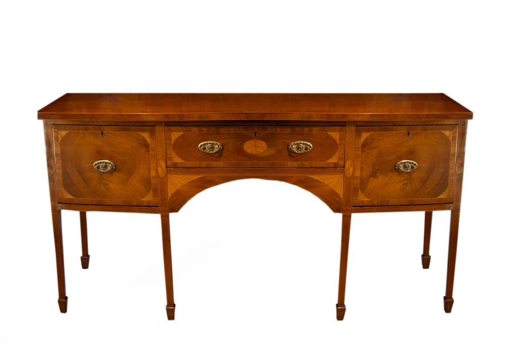 # W030 - Refined George III bow fronted mahogany sideboard inspired by the designs of George Hepplewhite (see his design book, 