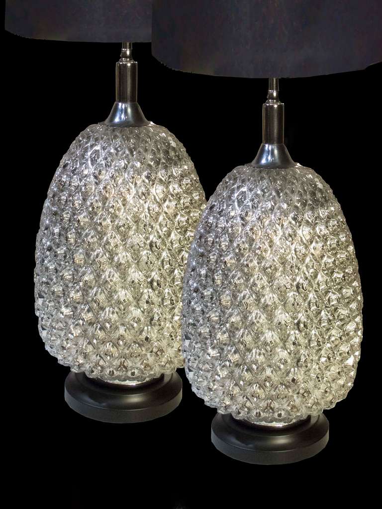 # A1011 - PAIR Mid-Century large scale Hollywood Regency pineapple form table lamps in mercury glass.  
Height of stylized pineapple; 15”
(shades not included) 
American, Circa 1960

See similar examples on our website.  

Florian Papp, fine