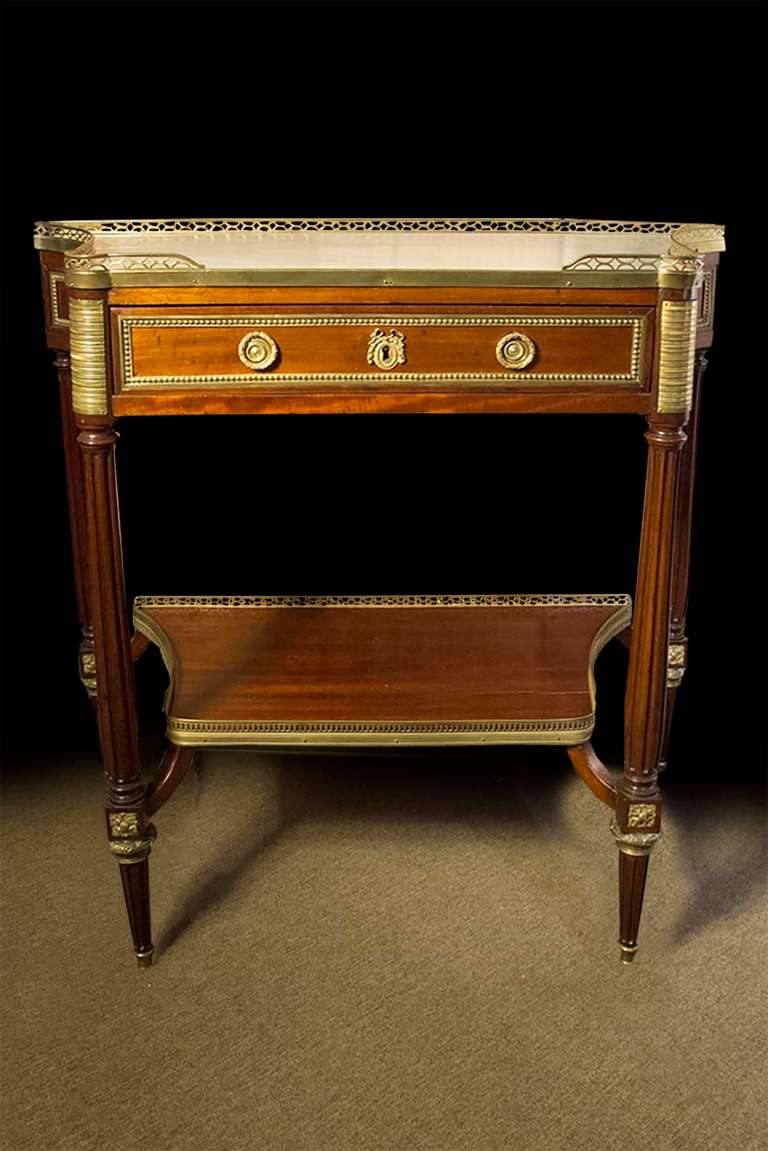 French Pair of Louis XVI Ormolu Mounted Mahogany Marble-Top Consoles Late 18th Century