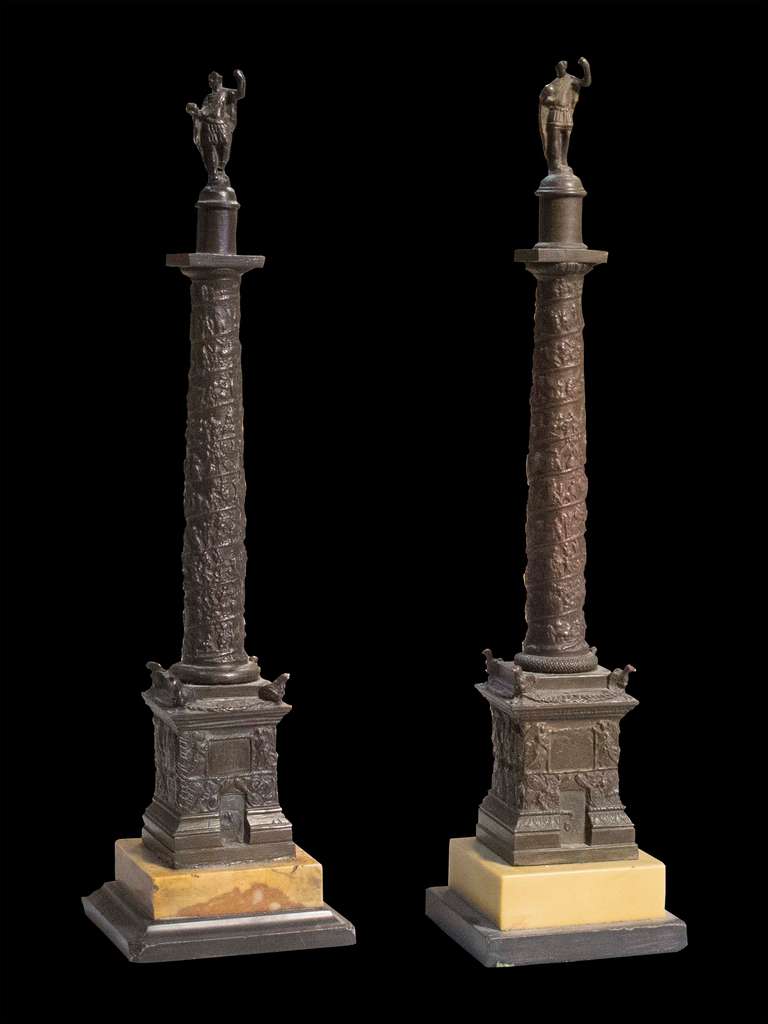 # A1043 - PAIR cast bronze Grand Tour Models of Trajans column. Each nicely executed with a rich brown patina. Figures of  Trajan  surmount the column with itâ??s spiral bass relief depicting the story of the epic wars between the Romans and the