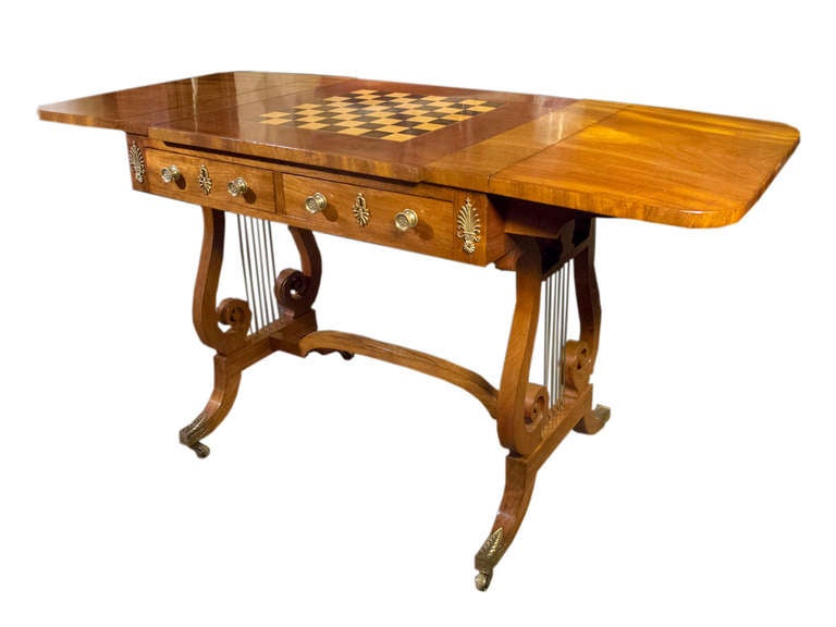 # S549 - Refined Regency mahogany sofa / games table.  Margaret Jourdain's book on 