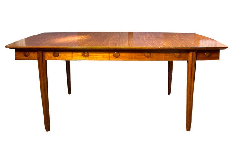 # X505 - English mahogany extending dining table made by Gordon Russell for the Festival of Britain, c 1951. The table designed by Frank Whitton with veneered top (including 24