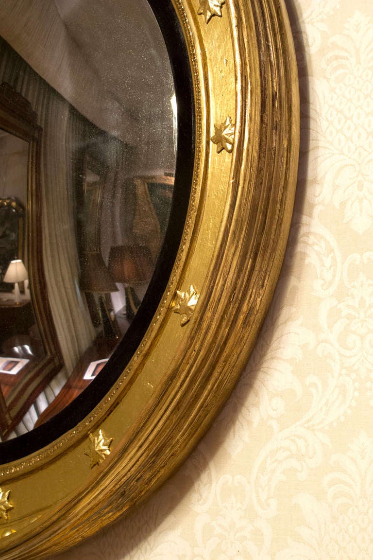 Regency Giltwood and Ebonized Convex Mirror, circa 1810 In Excellent Condition In New York, NY