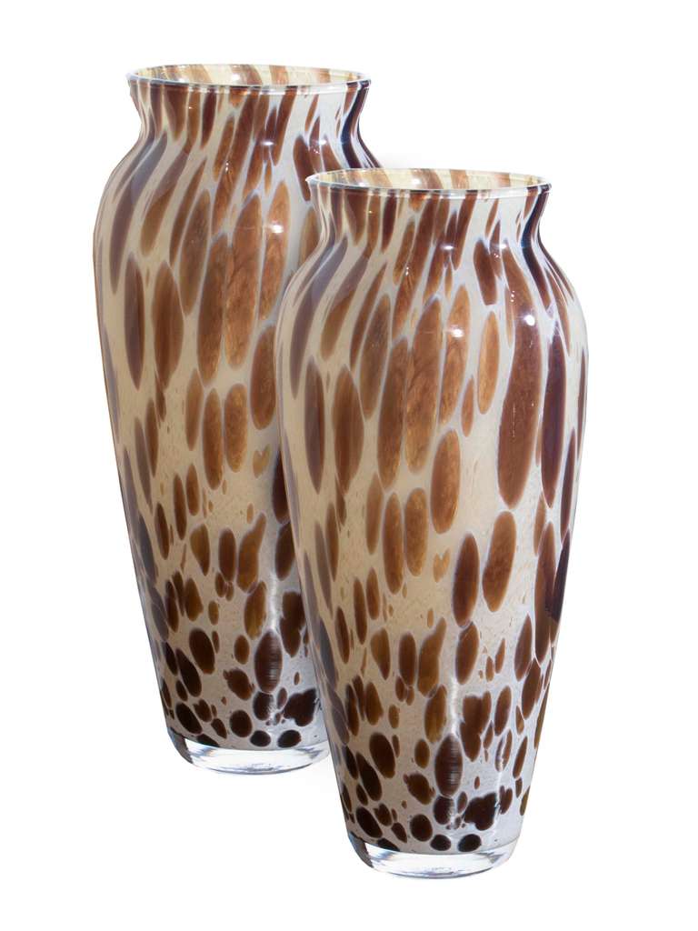 Pair of Italian glass vases of elongated form and narrow necks. Both the all over pattern and colors resemble a light stylized tortoise shell, 20th Century. (# ZA613 )
Click on 