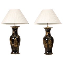 Fine pair of monumental mirror black baluster vases, mounted as Lamps