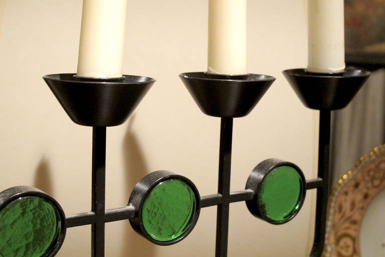 # ZA1004 - Kosta Boda table candelabra designed by Erik Hoglund a principal designer for the firm from 1953-1973.
 The black iron frame, made by Ystad-Metal, has an incised signature on the leg. The central arm supports four candleholders
