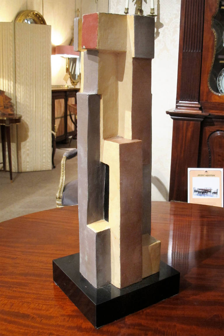 # ZA623 - Modernist polychrome painted wood sculpture in broken structure form, featuring rectangular pieces in a vertical, near-interlocking position. Possibly Cubist.
American, 20th century.

Click on 