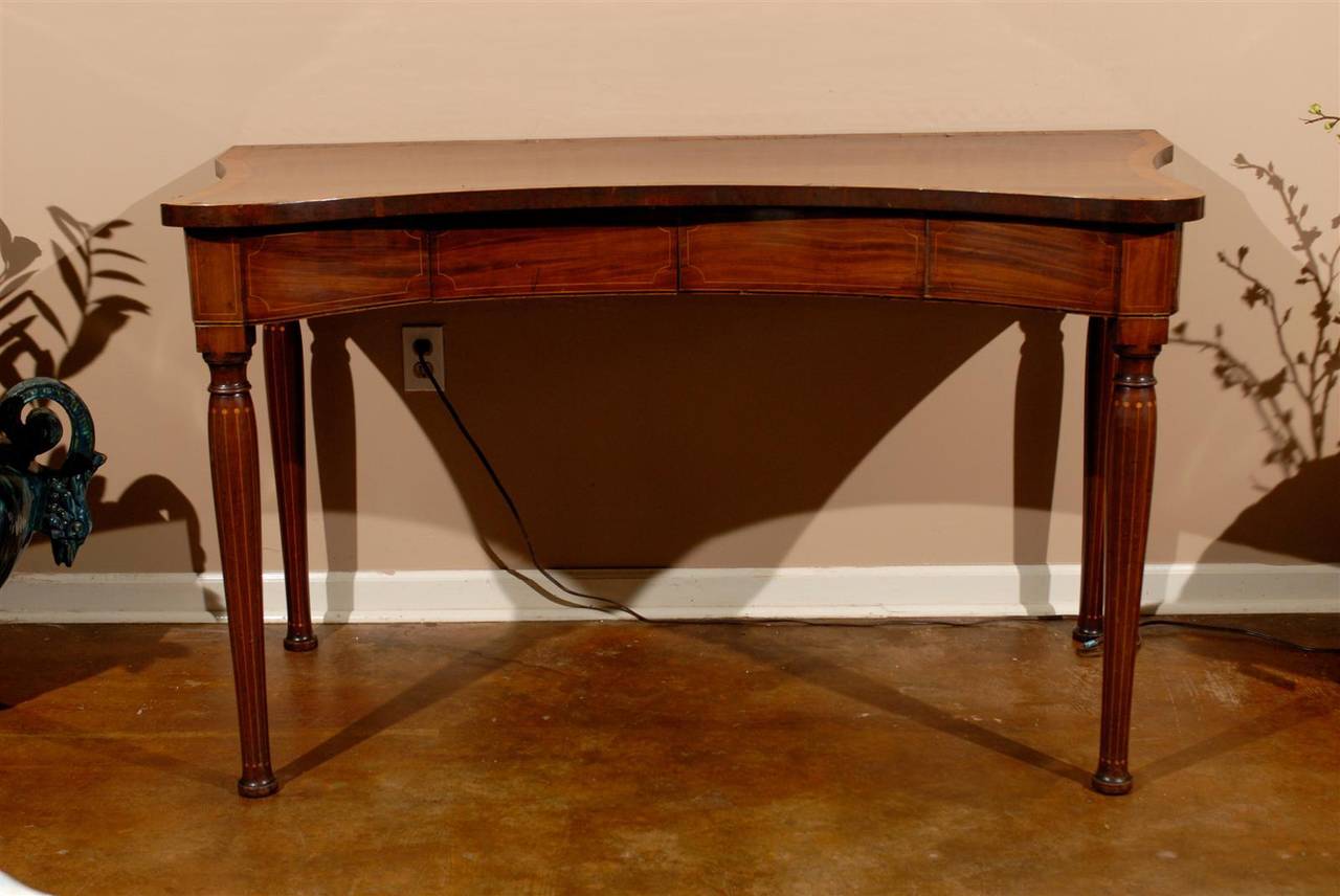 This is a fabulous console table. Notice the beautiful inlay on the top as well as on the legs.