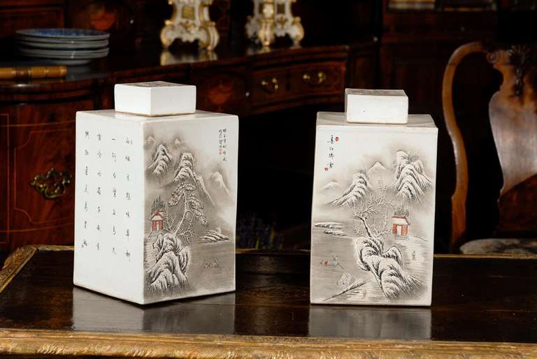Early to mid Republic period 1912-1949, white porcelain tea caddies with square lids. The rectangular shaped caddies display a beautiful snow-capped mountain scene on front and back. The shape, size and color of these caddies are quite rare and