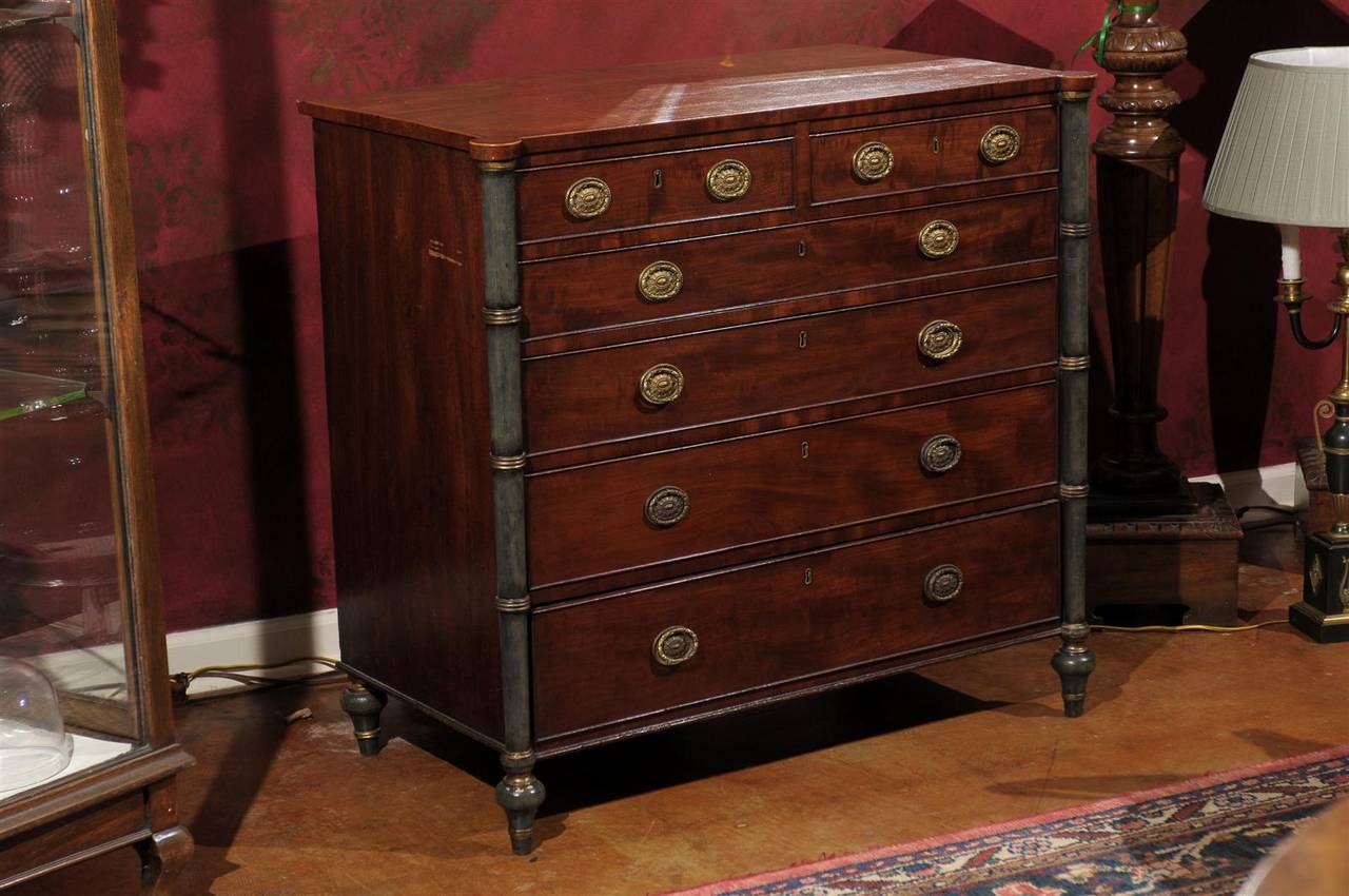 This beautiful chest has a rectangular crossbanded top with lobed front corners over configuration of 6 drawers and faux bamboo columns.