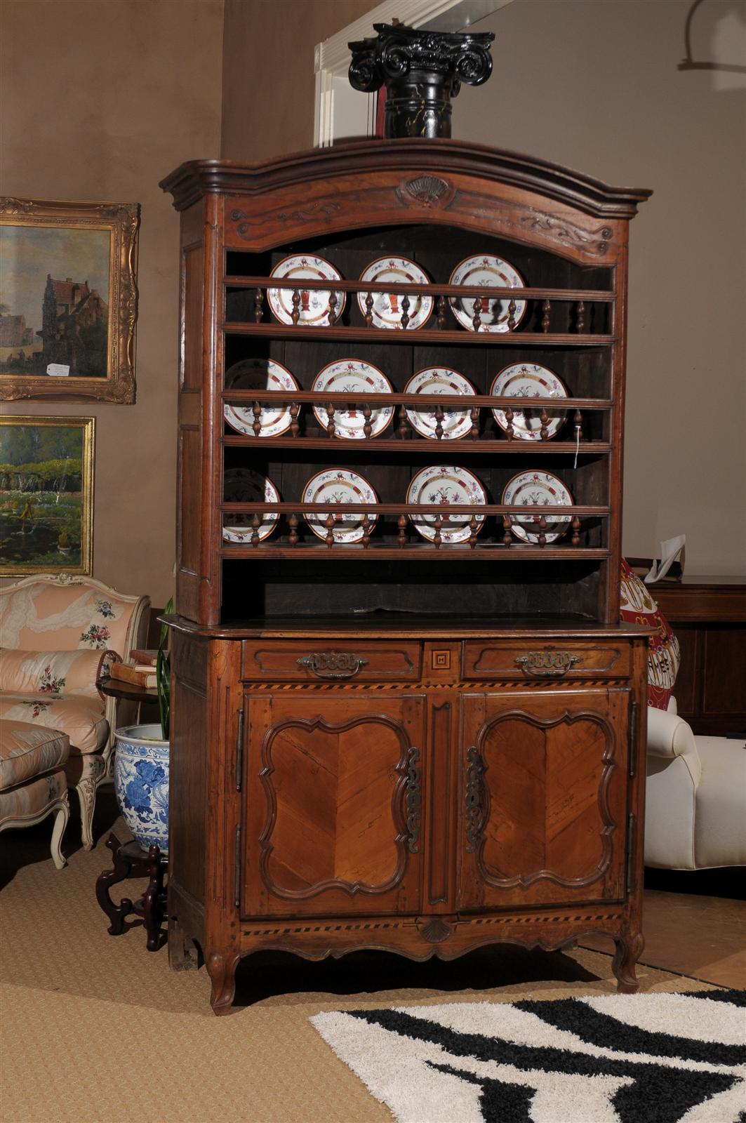 18th c. 1730- 1740,  Period Dome Top Crown Vaisselier.  This beautiful vaisselier is made of cherry and oak wood combination.  All but the bottom sides are cherry.  
The top portion has a relief carved shell with serpentine carving that runs along