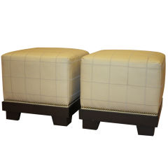 A pair of Cream Leather Ottomans