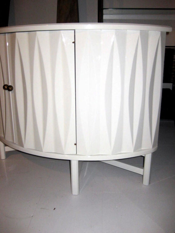 Very chic white lacquered demi-lune cabinet