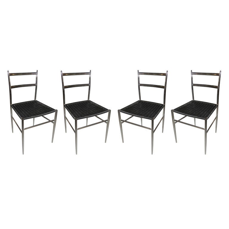 Four Gio Ponti Chrome And Woven Vinyl Chairs For Sale