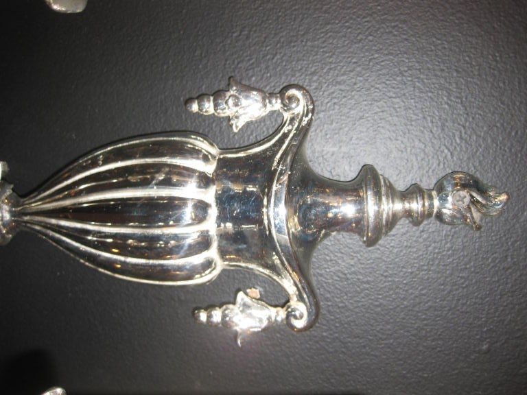 Set of 12 neo classical style silver plated bronze sconces.
