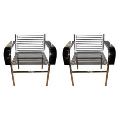 Pair Of Lounge Chairs In The Style Of Rene Herbst