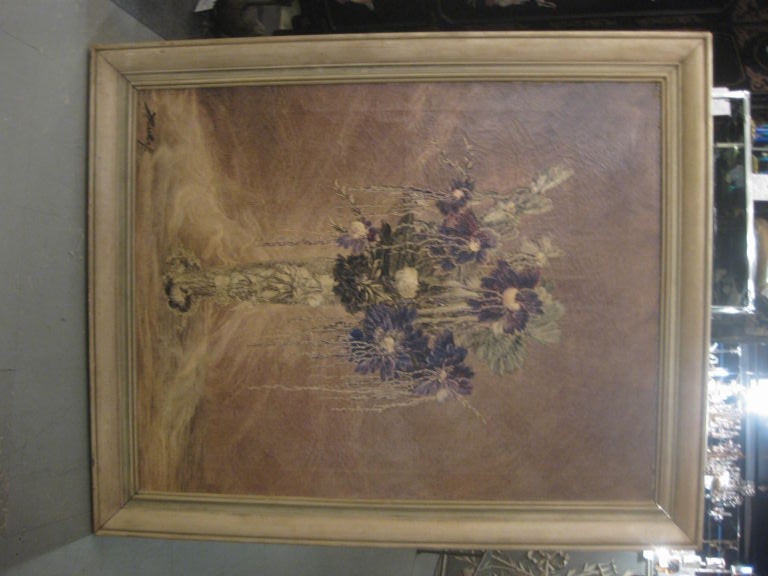 An early 20th c painting of flowers in a vase