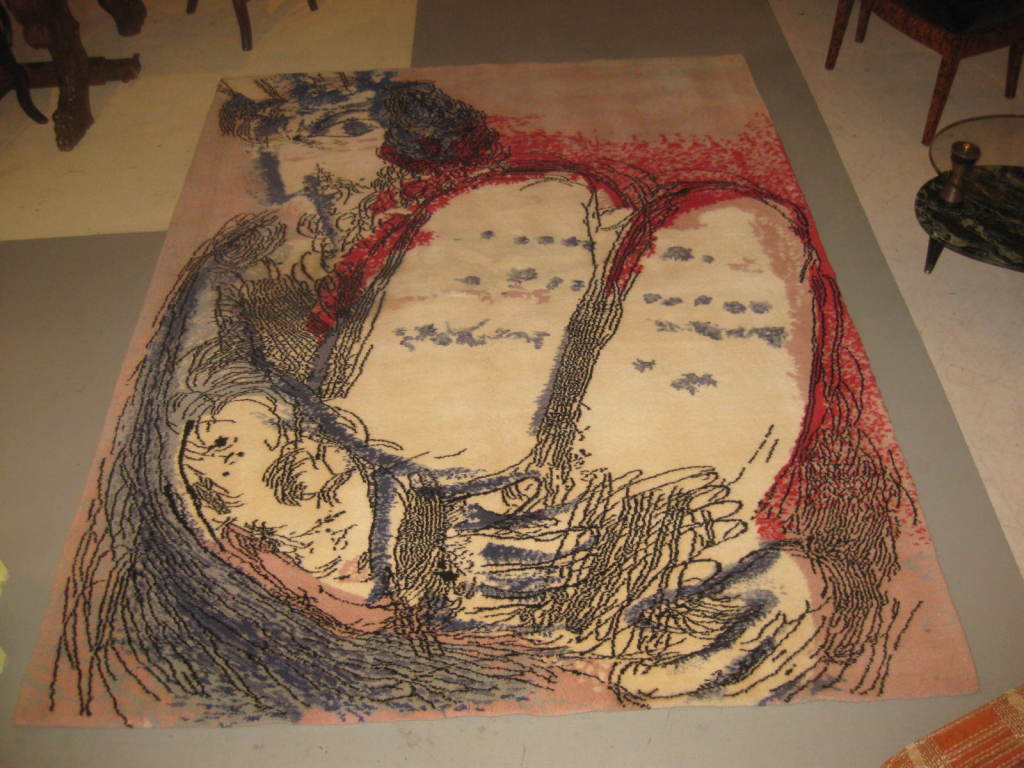 A Marc Chagall handmade rug. Chagall is woven on the back of the rug