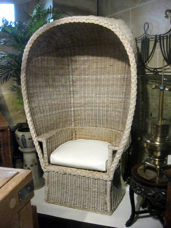 Fabulous wicker Porter chair with custom seat cushion.