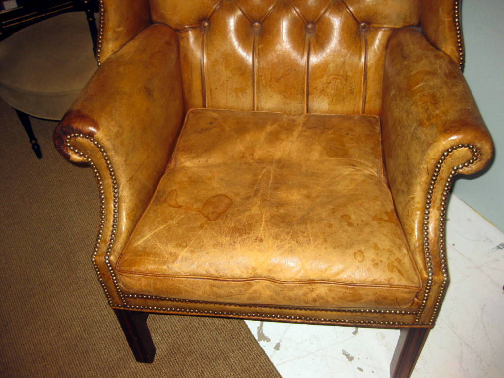 19th Century Antique Tufted Leather Wing Chair For Sale