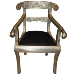 Hammered Metal Chair With Rams Heads On The Arms