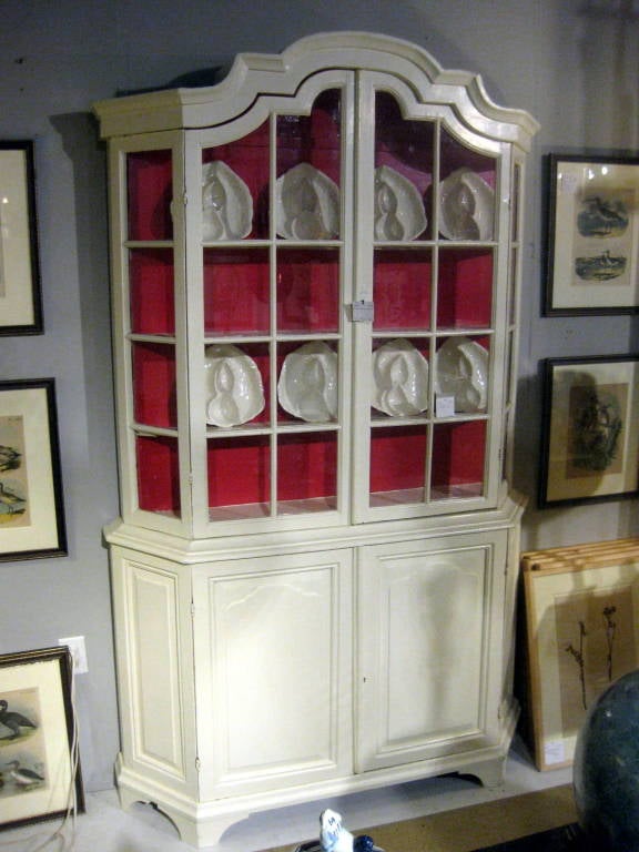 A Painted wood display cabinet