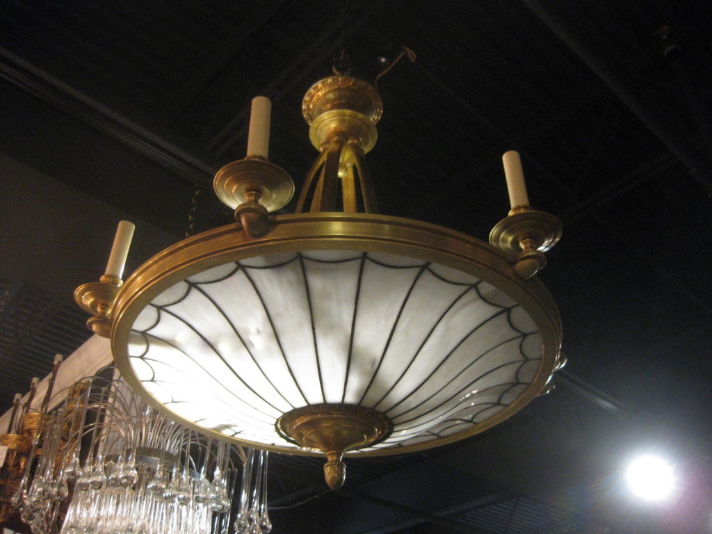 A large Caldwell leaded glass chandelier with interior lights