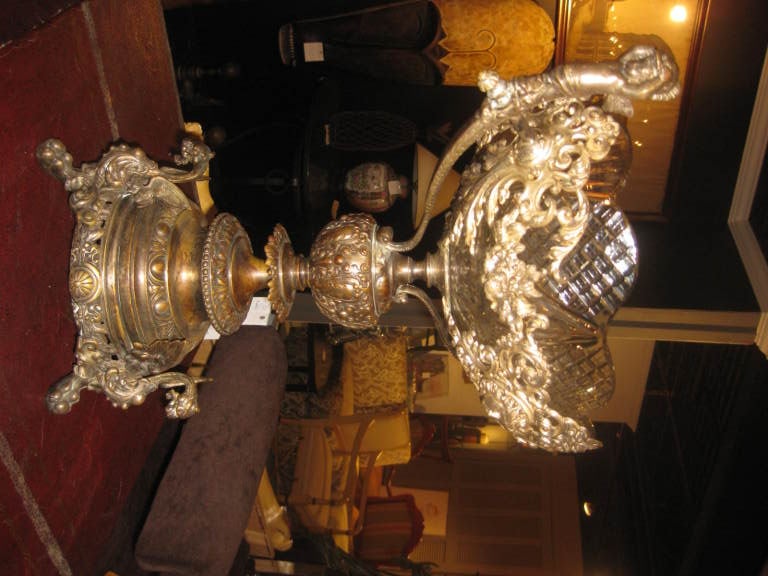 Antique centerpiece with it's original cut crystal center bowl.Museum quality cetail and execution.
