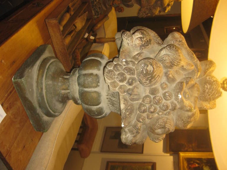 A large pair of large plaster fruit urn lamps