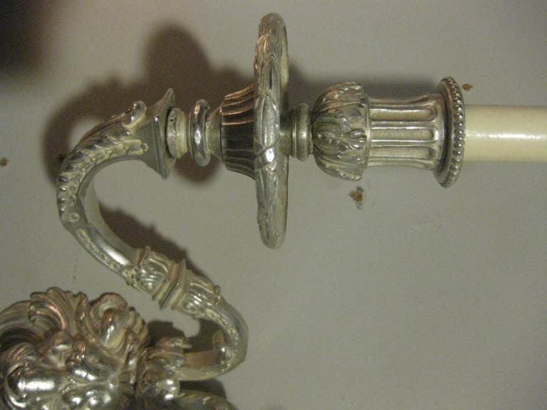 Pair of Silver Plated Caldwell Sconces with Lions' Heads In Good Condition For Sale In Stamford, CT