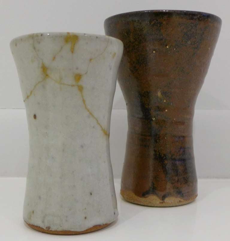 Two wheel-thrown and heavily glazed stoneware vases by Minnesota potter Warren Mackenzie (b. 1924).  A student of Bernard Leach, Mackenzie's work was highly influenced by Leach's mentor, Shoji Hamada.
HIs half-century output of mingei