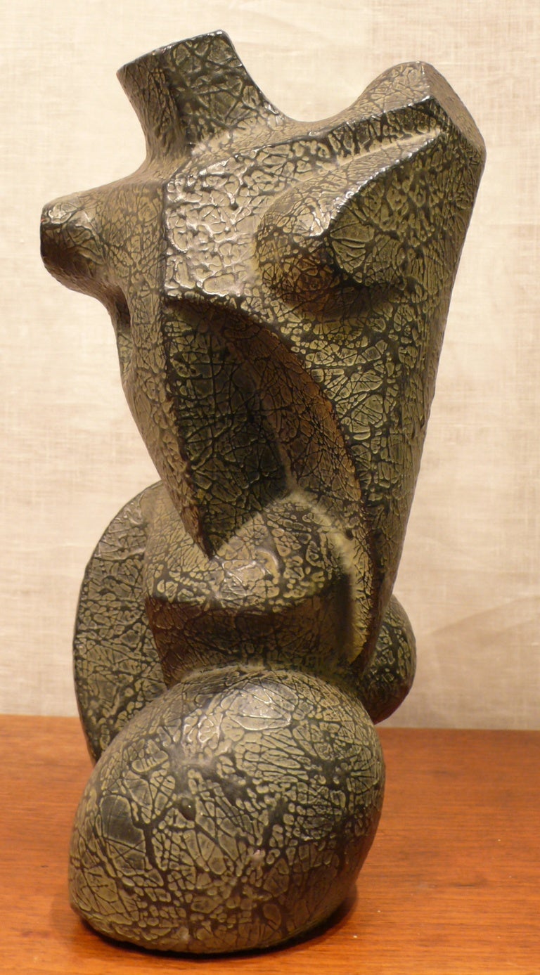 Cubist torso of modeled clay with texture-painted surface by German/American artist Peter Lipman-Wulf (1905-93) executed c. 1950. Lipman-Wulf was born in Berlin and received his Master's degree from the Academy of Fine Arts, Berlin.  HIs sculptural