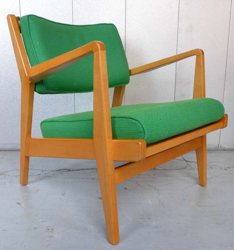 Jens Risom low armchair, model no. U-430, in birch with loose fabric cushions.  Produced by Jens Risom Design, Inc, c. 1958, and reupholstered within the past decade. In fine condition.  The seat height angles up from 13.5