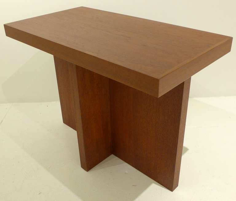 Rectangular walnut side table with a mitered top and cruciform base, designed by Vladimir Kagan and produced by Kagan-Dreyfuss c. 1958.  Part of a residential commission for a graduate of Pratt that included a biomorphic sofa, a Tri-Symmetric lamp