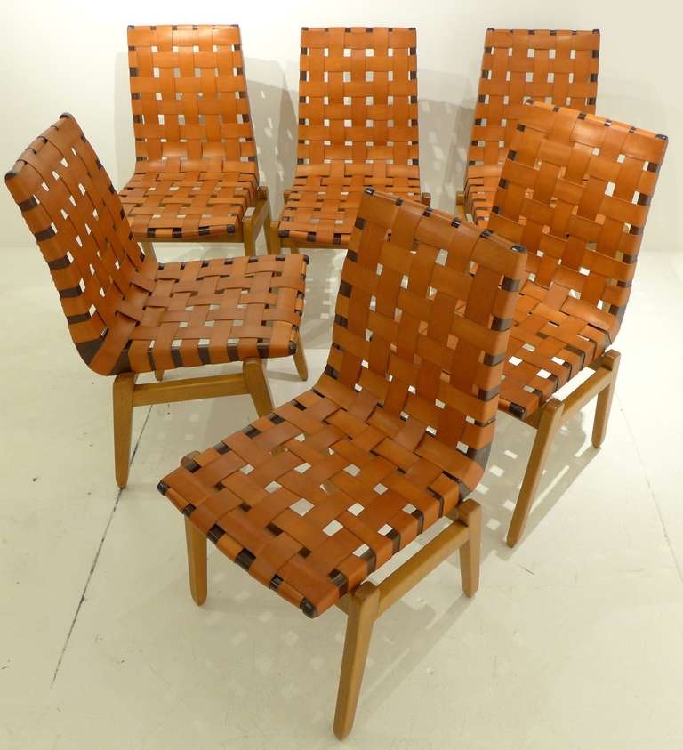 A rare and early set of six dining chairs designed by Danish-born Abel Sorenson, a charter member of the Knoll Planning Unit, produced by Knoll Associates, Inc., circa 1946. Two-tone birch with replaced saddle leather webbing, sourced from Edelman.