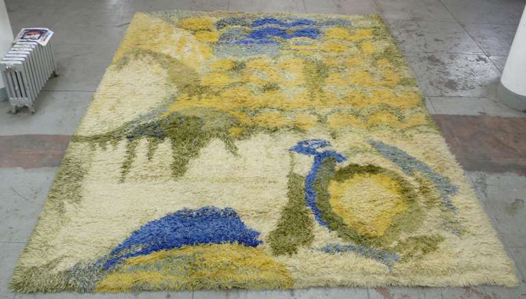 Long-pile (shaggy), 14' x 10' wool rug with abstract pattern, titled 