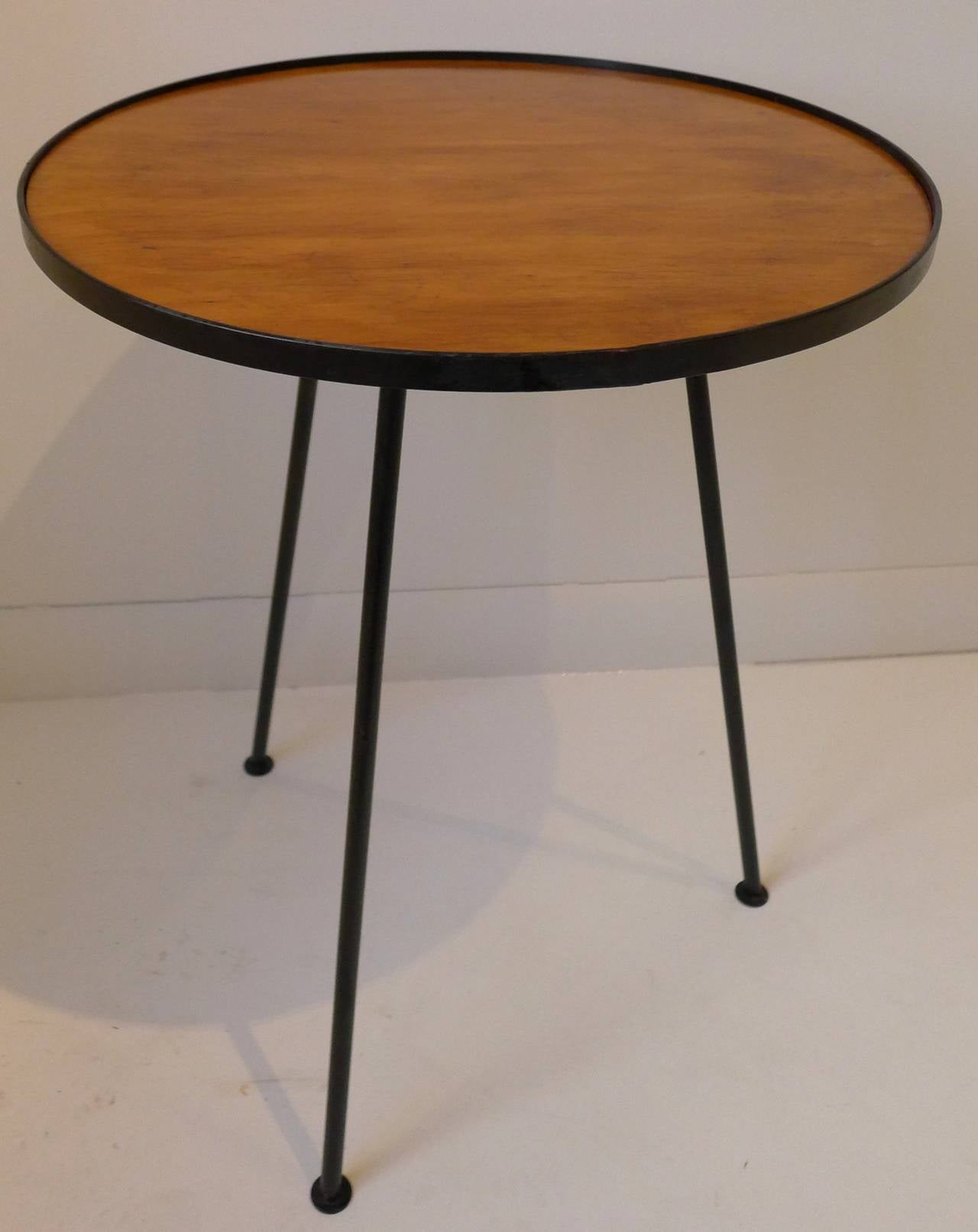 Handsome and nicely proportioned side table in birch and blackened iron.  Designed by Ben Seibel and made by Post Displays of New York City for distribution by Raymor, c. 1951.  A fine but rarely seen example of American postwar design. Ref: 