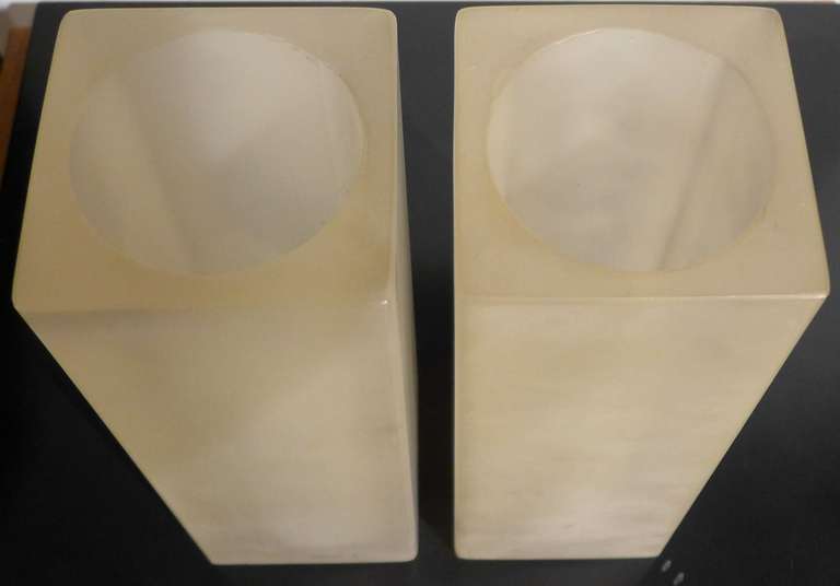 Pair of vintage, hand-finished, frosted resin vases by Vancouver designer and artist Martha Sturdy. Known for her Minimalist functional art, Sturdy began making this series of geometric resin vases in the 1980s. She explored resin for its sensual