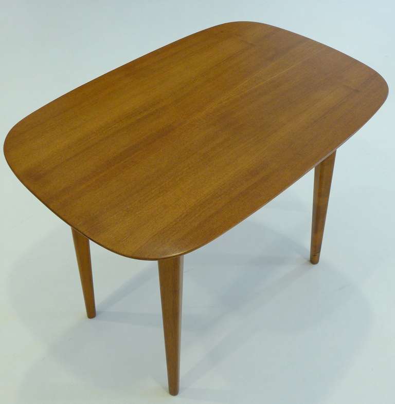 Early Knoll side table, #NK 5, by Swedish designer Elias Svedberg, made in Sweden by Nordiska Kompaniet (NK) for U.S. distribution by Knoll.  Elm top with birch legs.  Refinished.  With the NK branded marks.