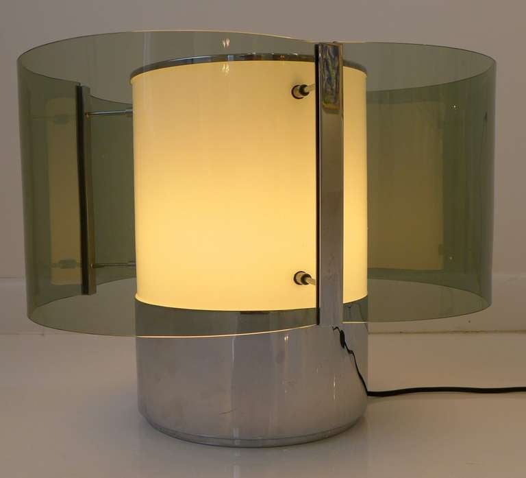 Rare glass and nickel lamp designed by Alberto Rosselli and produced by Fontana Arte in the mid-1960s. Rosselli (1921-1976) was Gio Ponti's son-in-law and a partner with Ponti in Studio PFR.
In addition to working on the Pirelli Tower, Rosselli