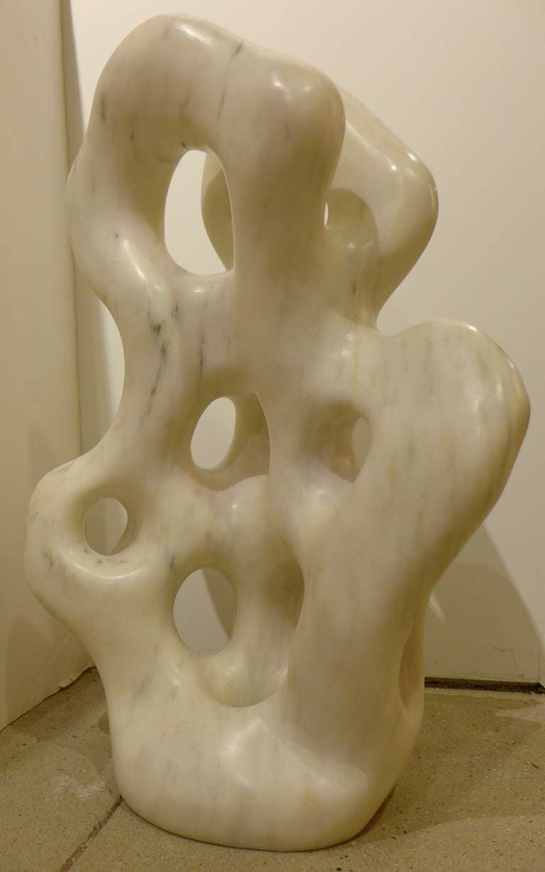Biomorphic sculpture carved and polished from a block of marble by Orangeburg, NY sculptor Jeffrey Burtch.  Executed c. 1980's.
Marked with artist's initials.