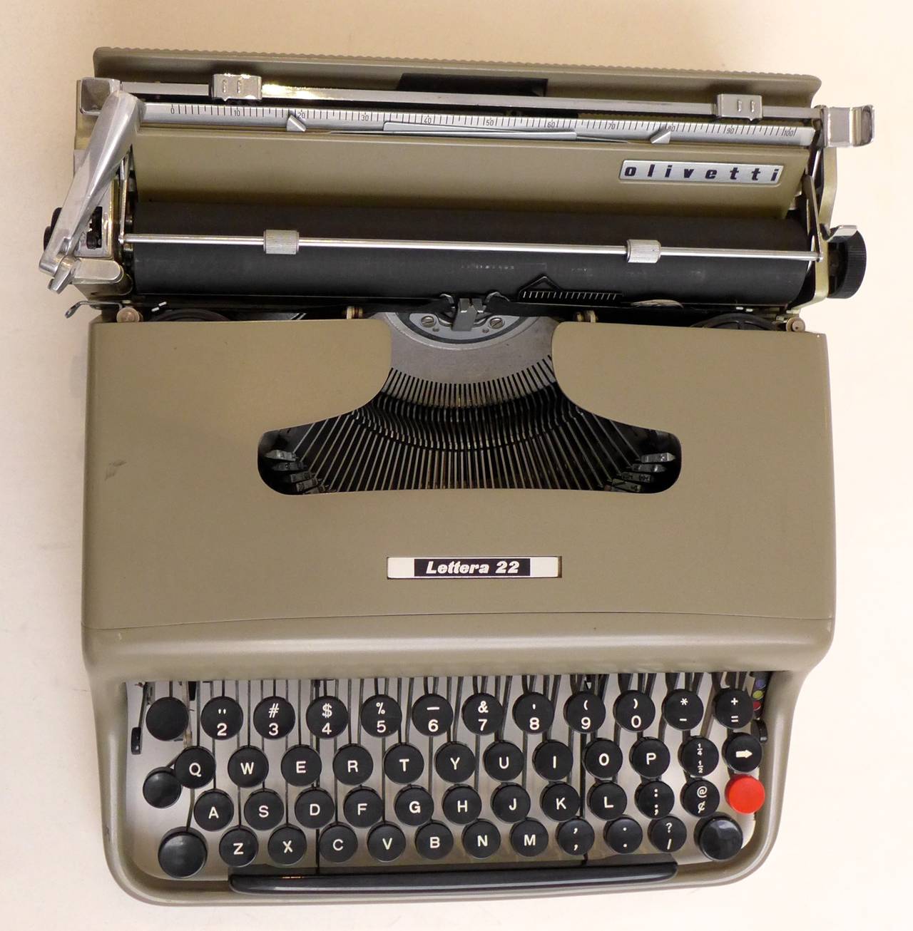 Lettera 22 portable typewriter, of enameled metal and plastic, designed by Marcello Nizzoli and produced by the progressive manufacturer Olivetti in Italy, circa 1954. Nizzoli (1887-1969), a painter, graphic artist, and architect was Olivetti's